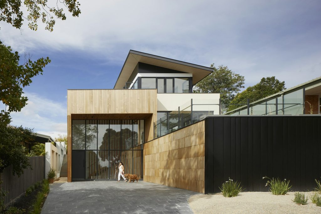 Modern two-storey house with timber facade